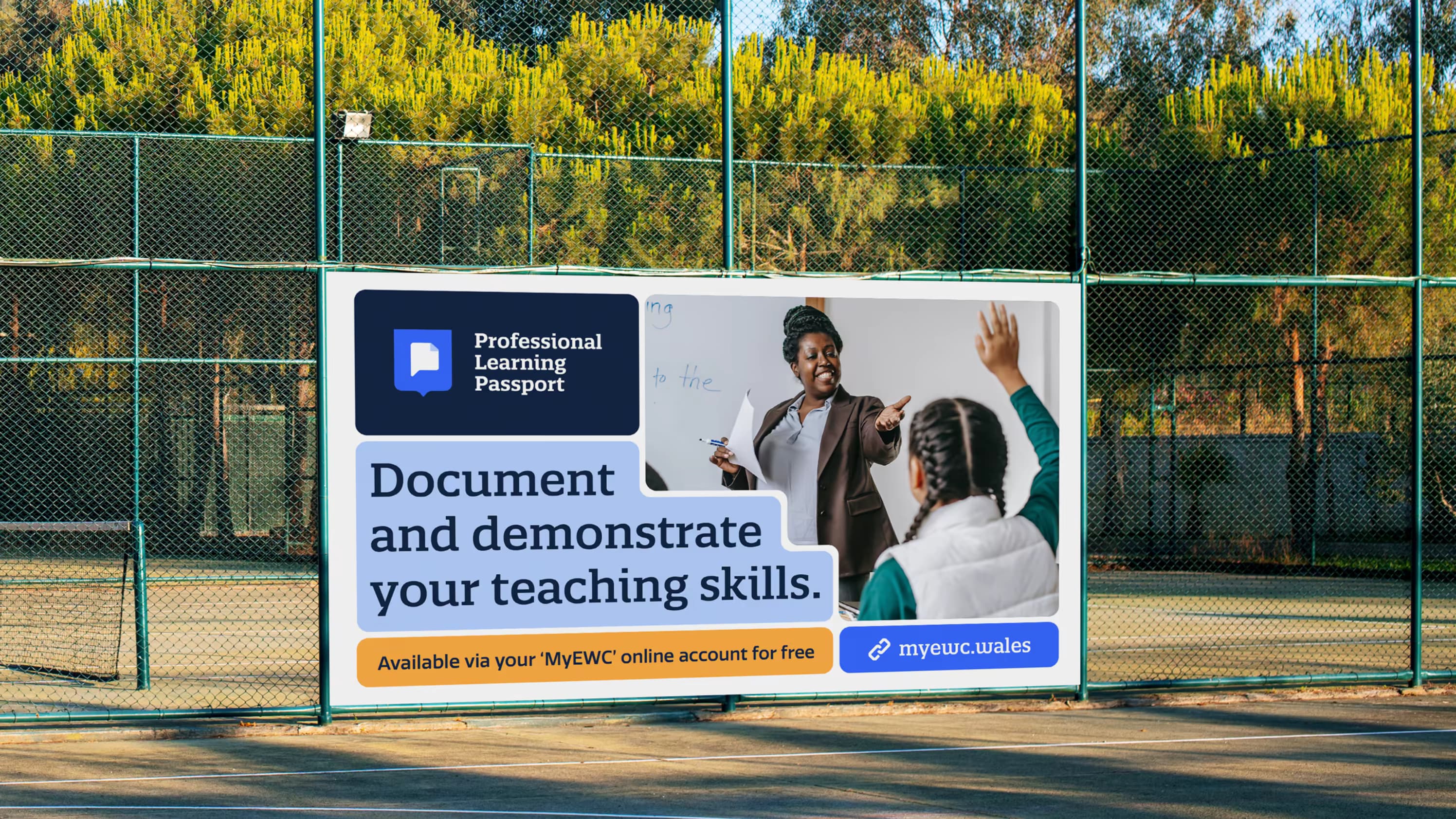 A billboard in the middle of a school yard showing an advert for PLP